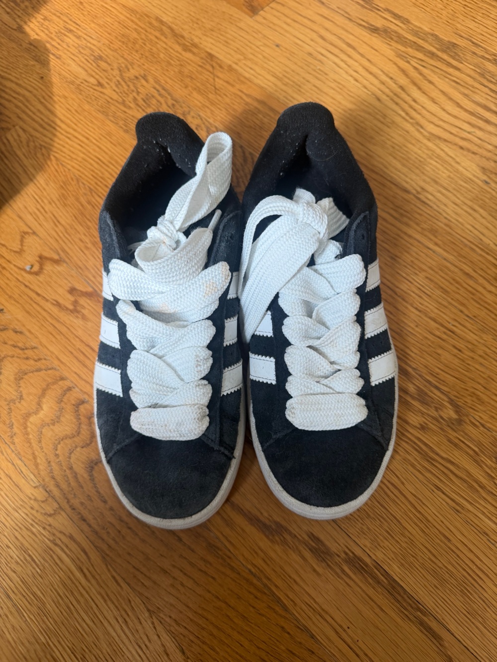 adidas women’s Black Suede Sneakers with White Stripes and Laces